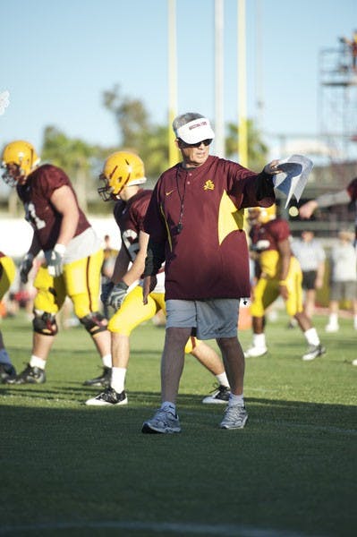 MAN IN CHARGE: ASU football coach Dennis Erickson directs his team during a spring practice earlier this month. The Sun Devils will hold their annual spring game on Saturday afternoon at Sun Devil Stadium. (Photo by Michael Arellano)