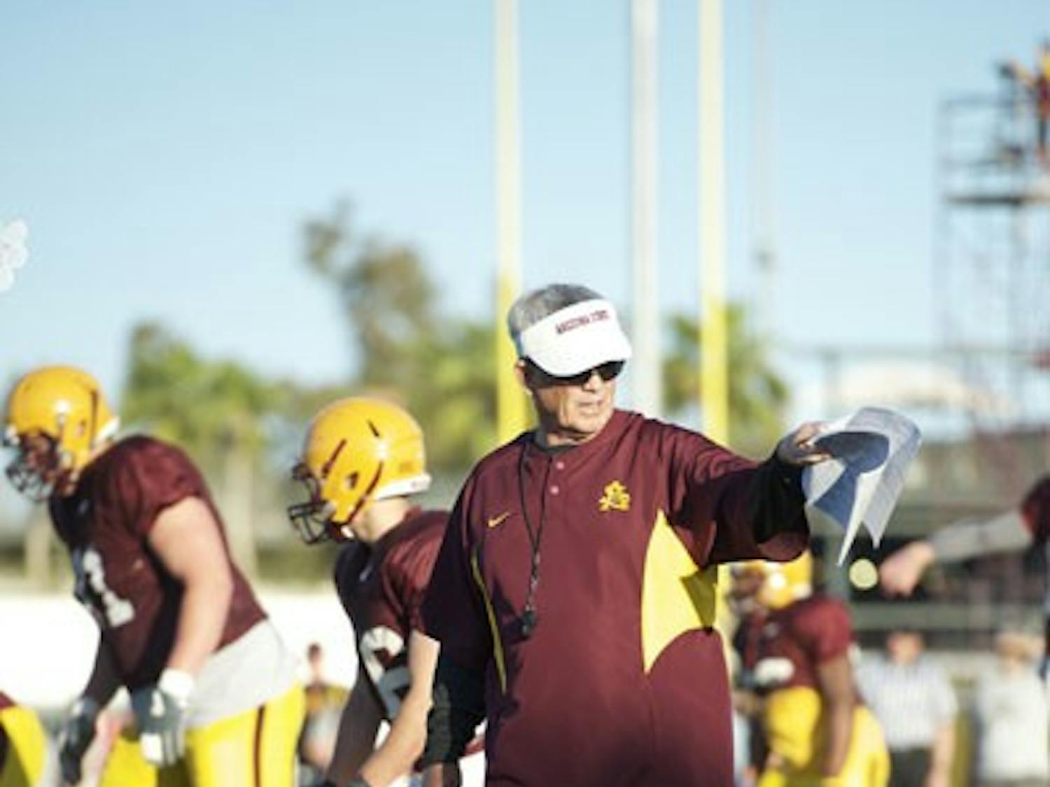 MAN IN CHARGE: ASU football coach Dennis Erickson directs his team during a spring practice earlier this month. The Sun Devils will hold their annual spring game on Saturday afternoon at Sun Devil Stadium. (Photo by Michael Arellano)
