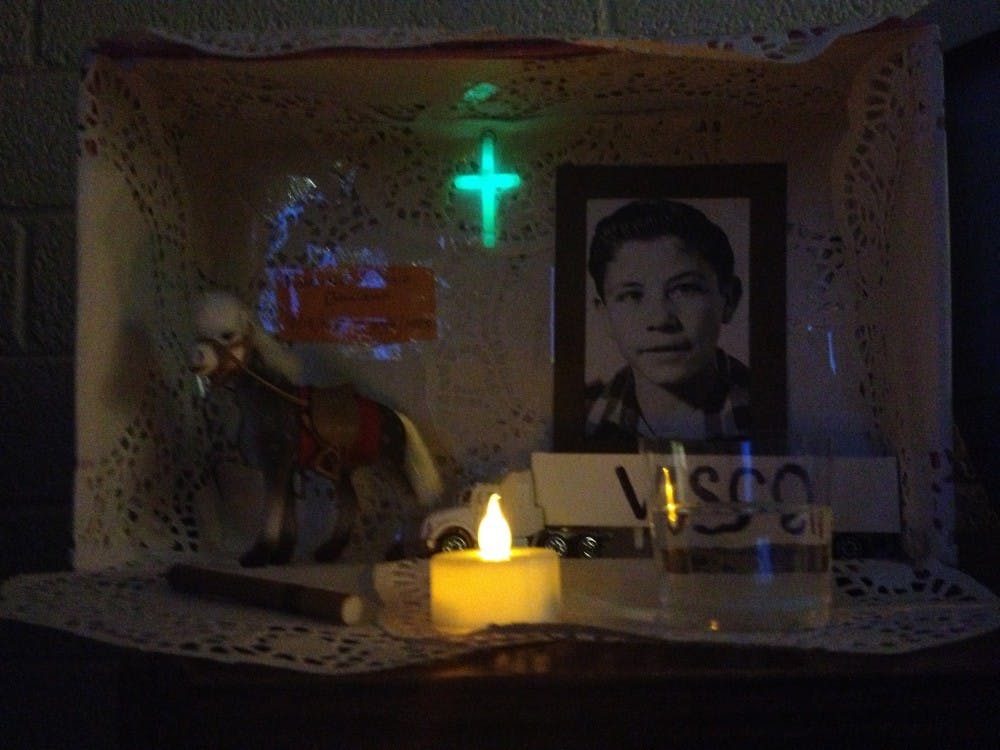 A traditionally-crafted altar created for the writer's grandfather. Photo by Alec Damiano