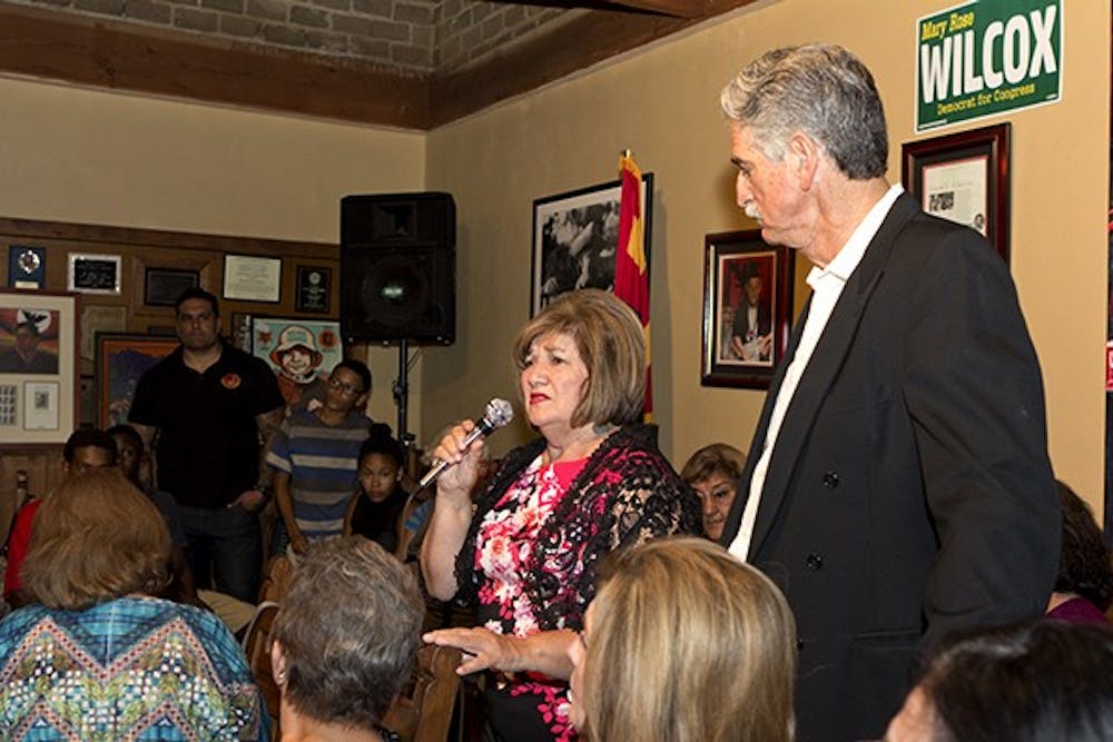 Mary Rose Wilcox gives a concession speech after losing the Democratic candidacy for the 7th Congressional District to Ruben Gallego. Her husband Earl Wilcox stands next to her.