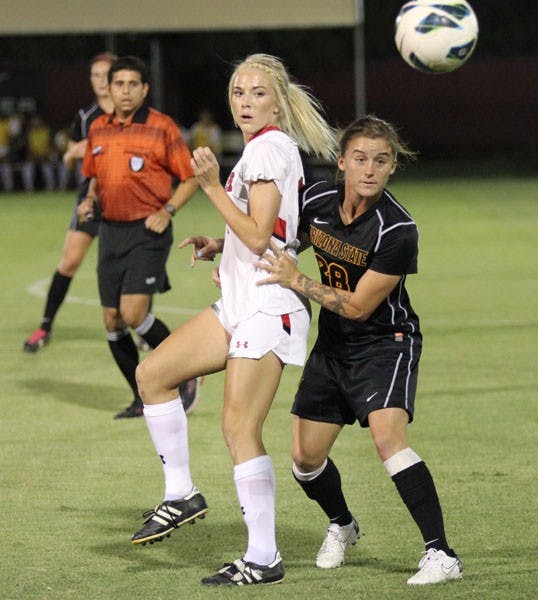 Senior midfielder Taylor McCarter (right) spots the loose ball during the Sun Devils’ 4-1 win over Utah on Oct. 25. (Photo by Kyle Newman)