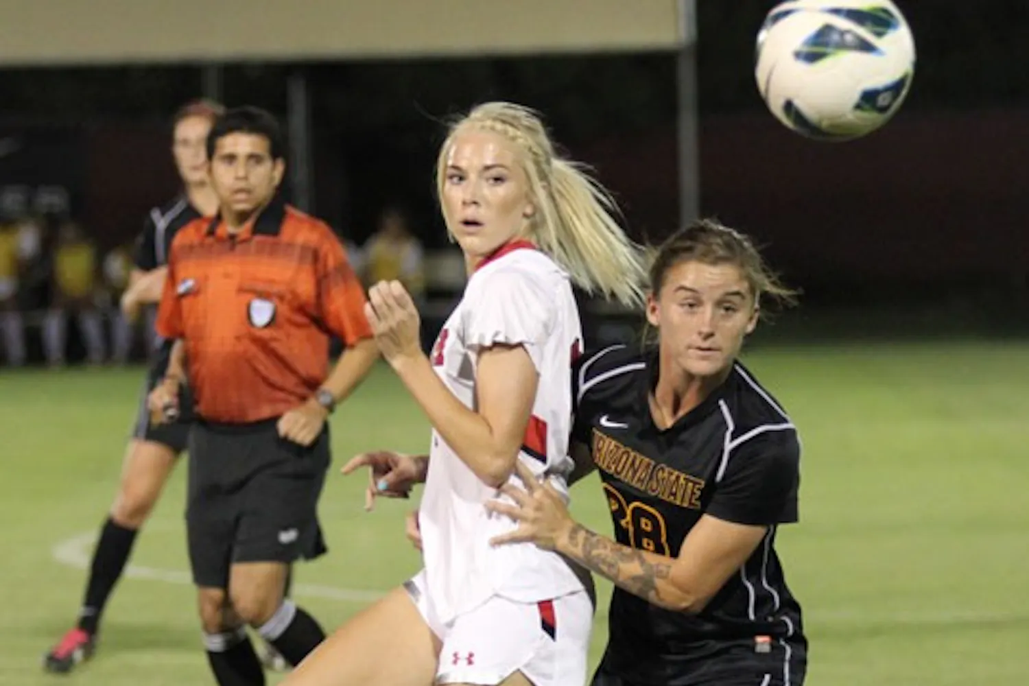 Senior midfielder Taylor McCarter (right) spots the loose ball during the Sun Devils’ 4-1 win over Utah on Oct. 25. (Photo by Kyle Newman)
