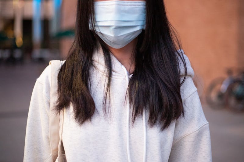 An ASU student wears a face mask around the Tempe campus in Tempe, Arizona, on Monday, Jan. 27, 2020.