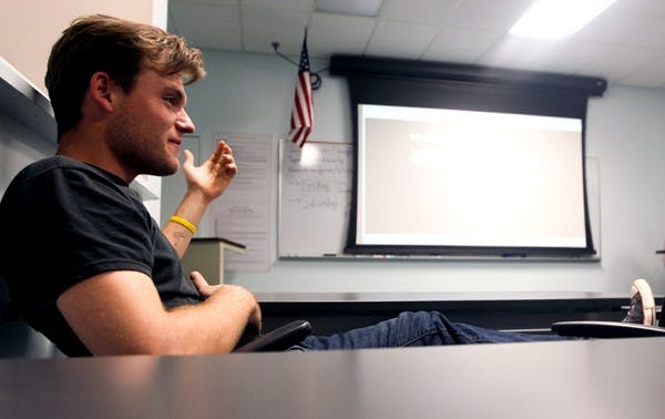ASU senior Shane Garst speaks up at a Secular Free Thinker's Society meeting. Garst, who is majoring in German and Russian studies, is the leader of the club. (Photo by Dominic Valente)