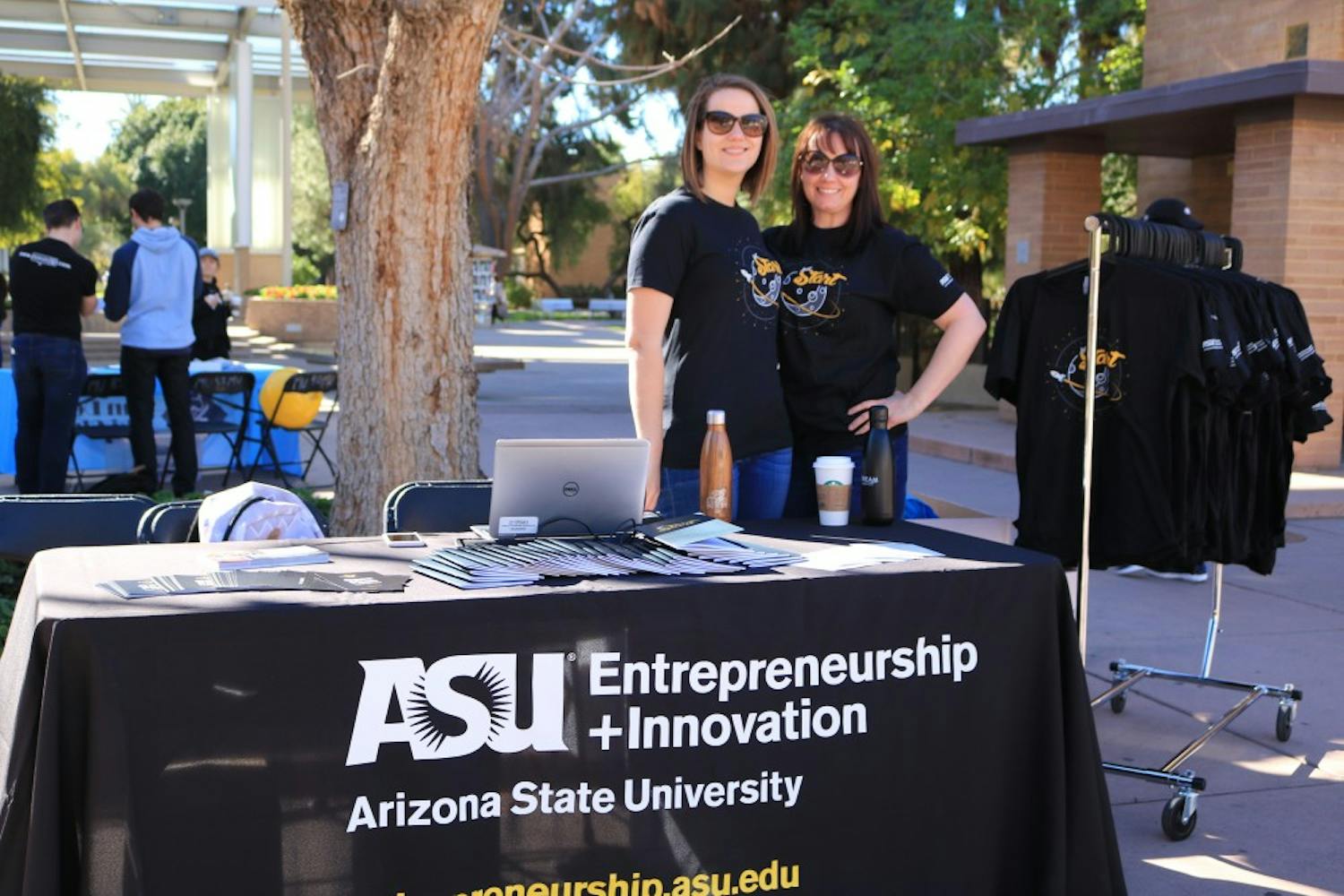 Program Manager&nbsp;Lauren Dunning (left) poses for a photo&nbsp;with her colleague at the Venture Devils table near the&nbsp;Memorial Union at the ASU Tempe campus&nbsp;on Wednesday, Feb. 1, 2017.