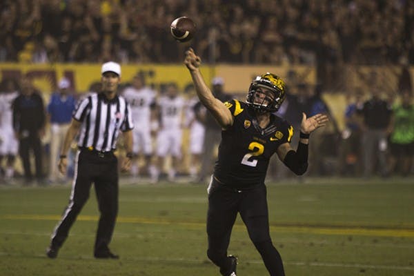 Redshirt junior quarterback Mike Bercovici throws the ball in a home game against UCLA on Sept. 25, 2014. The Sun Devils lost to the Bruins, 62-27. (Photo by Alexis Macklin)
