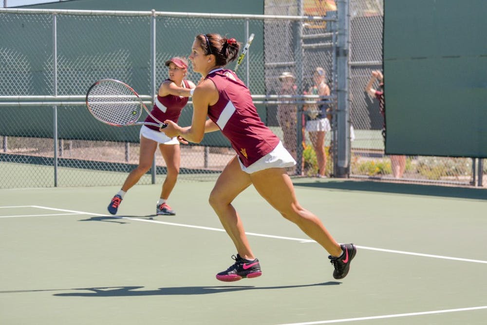Juniors Stephanie Vlad and her partner Desirae Krawczyk played against the Gold Bears during Saturday's  Double's Match at Whiteman Tennis Center, on March 28, 2015. 