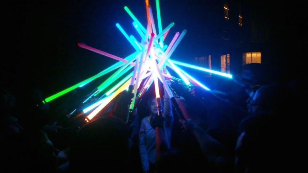 Members of AZ Saber raise up their lightsabers right before a battle at the MU in Oct. 2016.&nbsp;