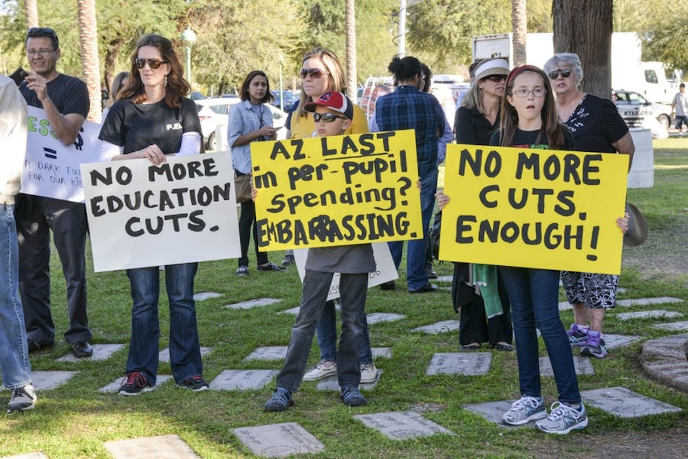 Many people gathered at the State Capitol Thursday, March 5, 2015 to protest massive cuts to public education that have been proposed by Gov. Doug Ducey and Arizona Republicans.&nbsp;