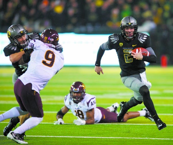 ONE-LOSS POWERHOUSE: Oregon redshirt freshman quarterback Bryan Bennett runs to the outside against ASU during the Ducks’ win earlier in the season.  Despite a loss, Oregon still has an outside chance at a BCS at-large bid. (Photo by Michael Arellano)