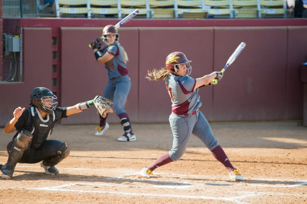 Junior Shortstop Chelsea Gonzalez  hits the ball over the fence for the first Sun Devil run in a game against Portland State on Sunday, Feb. 14, 2016, at  Farrington Stadium in Tempe. 