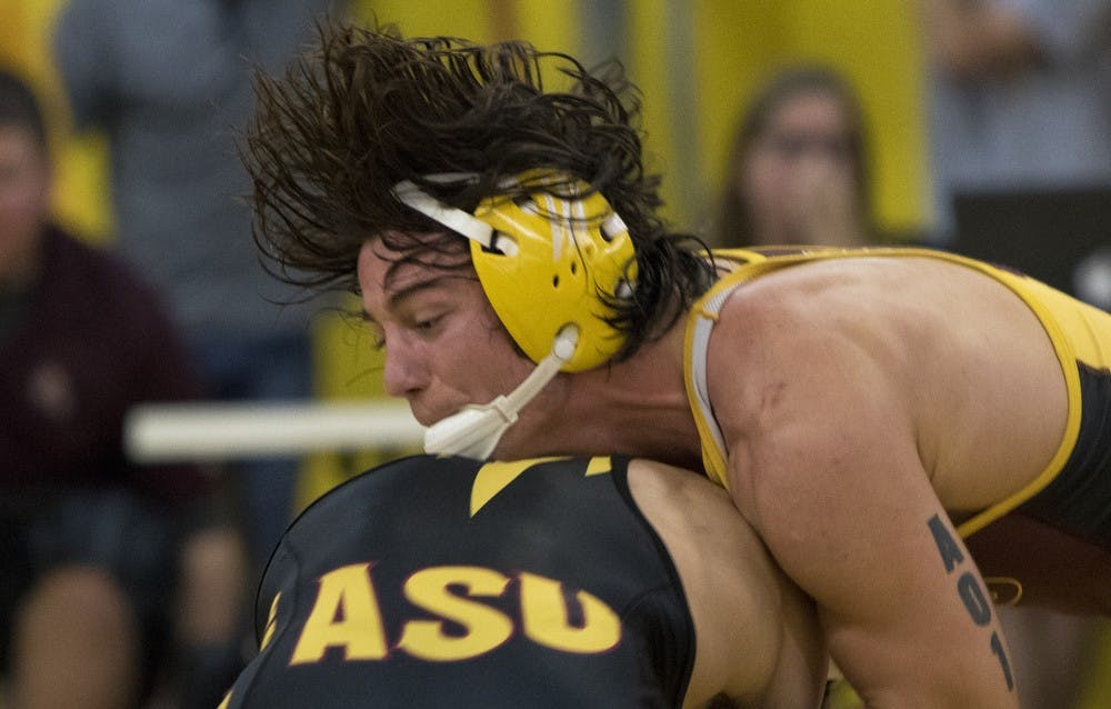 Redshirt freshman Koby Reyes competes against sophomore Robbie Mathers during an intrasquad match on Friday, Oct. 30, 2015, at Ritches Wrestling Complex in Tempe. Mathers defeated Reyes 7-1. 