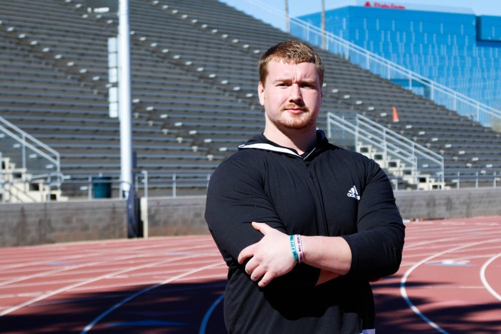 Redshirt Senior Thomas Anderson poses on the track at the Sun Angels Stadium on Friday, Jan. 27, 2017. 