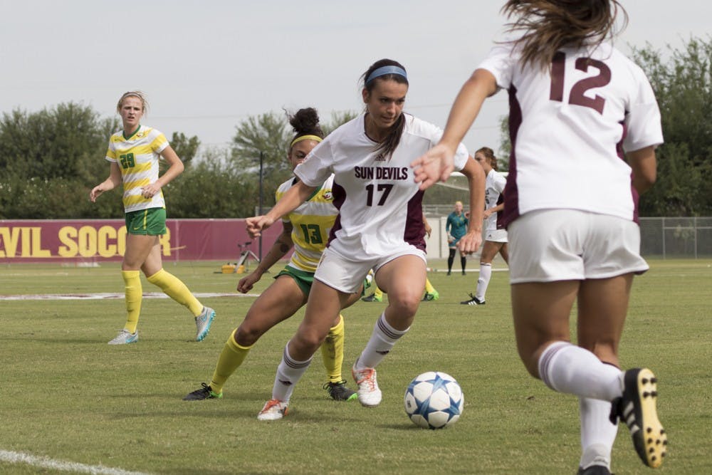 Senior forward Cali Farquharson fights for possession of the ball in the first half against Oregon on Sunday, Oct. 25, 2015, at Sun Devil Soccer Stadium in Tempe. The Sun Devils defeated the Ducks 1-0.