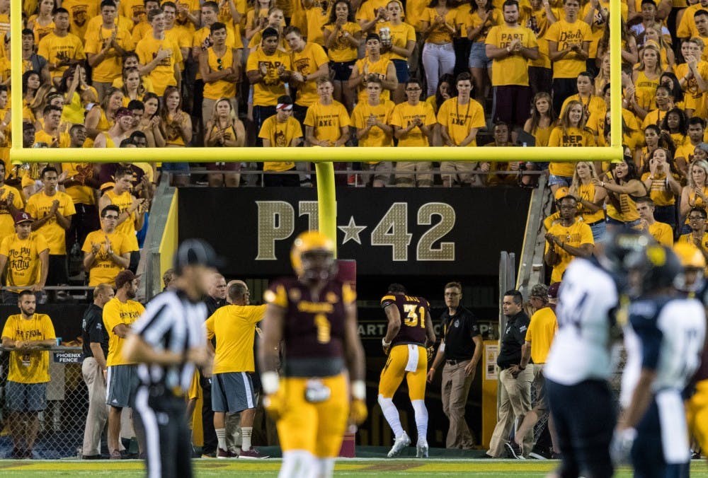 ASU redshirt junior linebacker Marcus Ball walks back to the locker room after being ejected for a targeting penalty during the third quarter of the game against Northern Arizona University in Sun Devil Stadium in Tempe, Arizona, on Sept. 3, 2016.