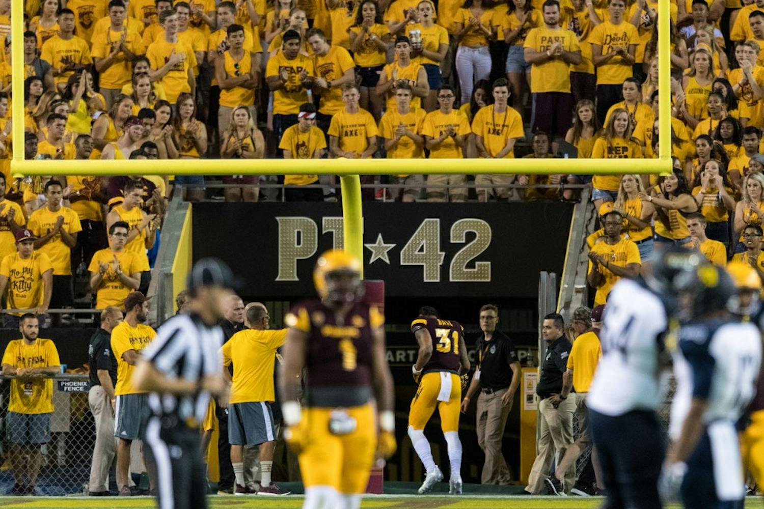 ASU redshirt junior linebacker Marcus Ball walks back to the locker room after being ejected for a targeting penalty during the third quarter of the game against Northern Arizona University in Sun Devil Stadium in Tempe, Arizona, on Sept. 3, 2016.