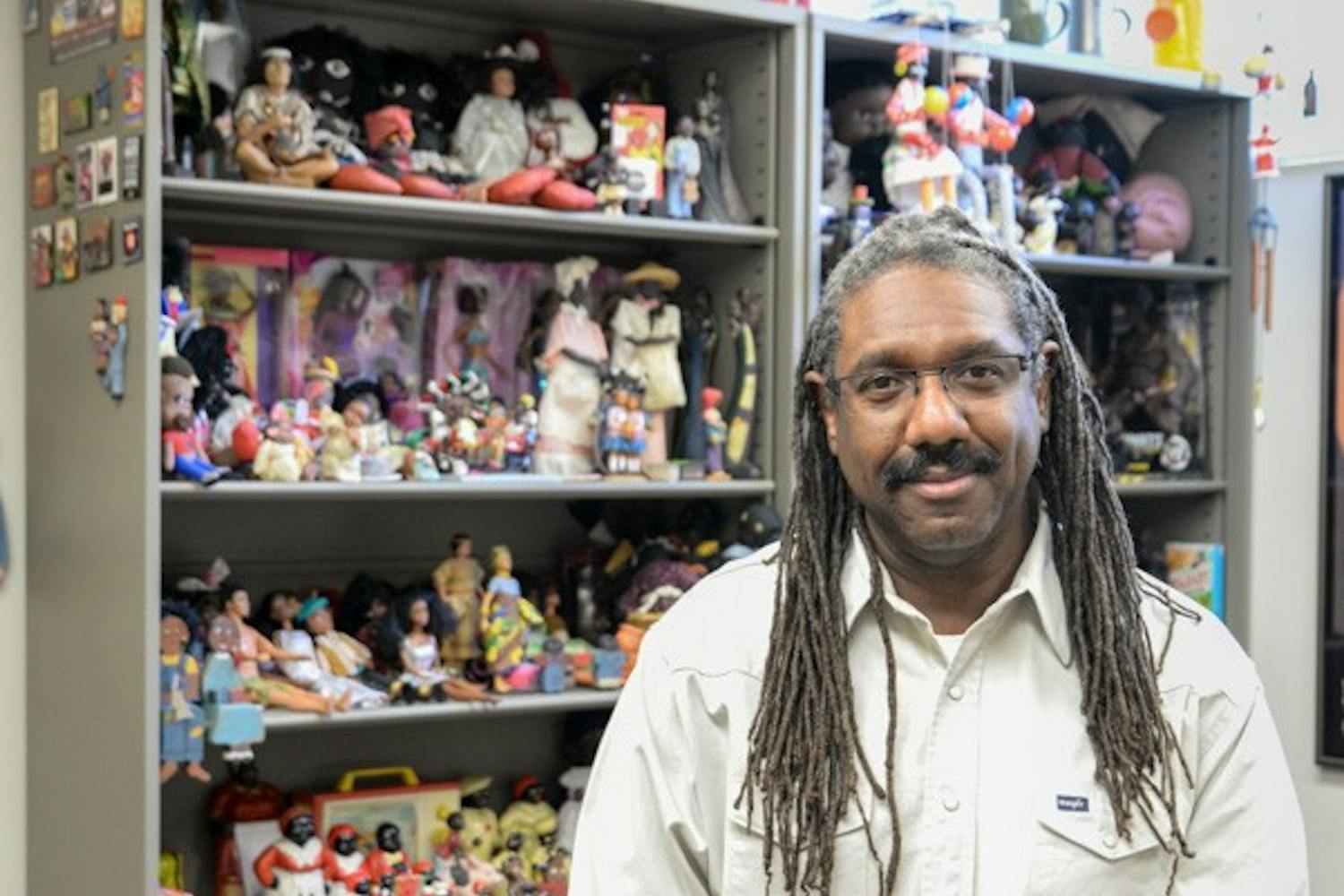 Neal Lester is pictured in his Project Humanities office in the Discovery Center on the Tempe campus on Thursday, Feb. 13, 2015. Lester recently received the Invisible Heroes award for his work in educating the community about prejudices, stereotypes and biases and his work within the LGBTQ community. (J. Bauer-Leffler/The State Press)