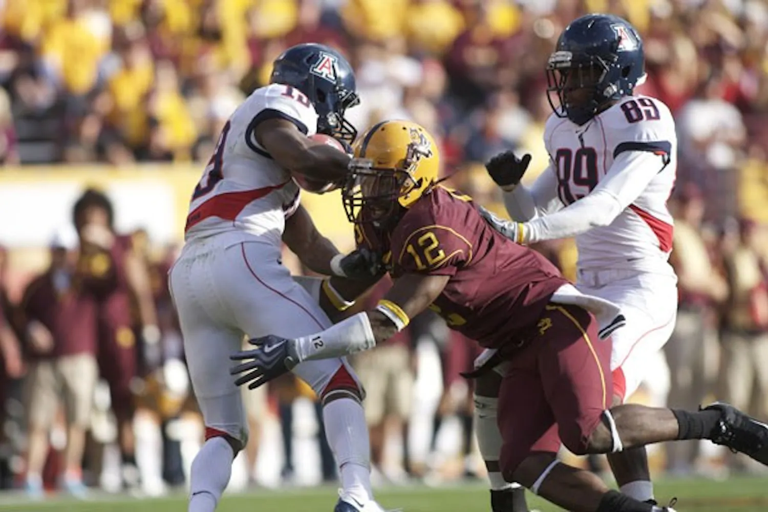 HARD HIT: Matthew Tucker goes for a tackle against the UA Wildcats during last season's final game. (Photo by Scott Stuk)