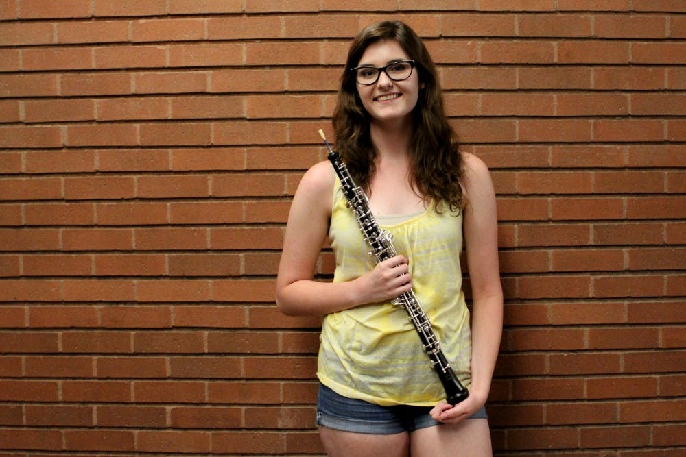 Material science and music performance freshmen Alexis Mitchell poses for the camera at the ASU School of Music. She plans to invent a synthetic oboe reed to help reduce the cost of current reeds that are temporary. (Photo by Diana Lustig)