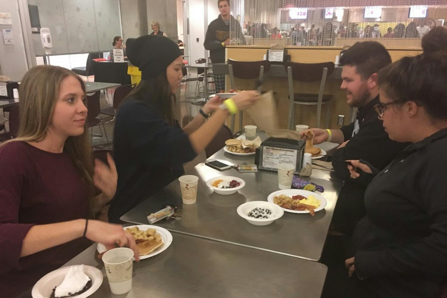 Students enjoy breakfast for dinner as part of the finals dinner hosted at the Taylor Place dining hall on Nov. 30.