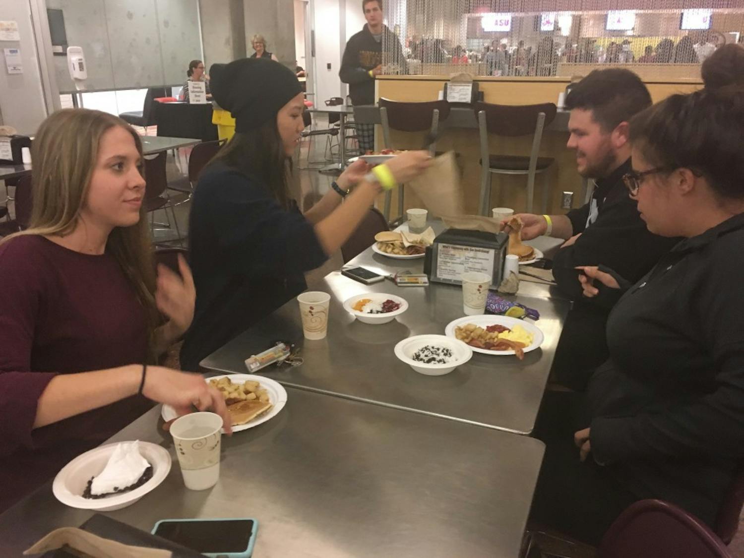Students enjoy breakfast for dinner as part of the finals dinner hosted at the Taylor Place dining hall on Nov. 30.