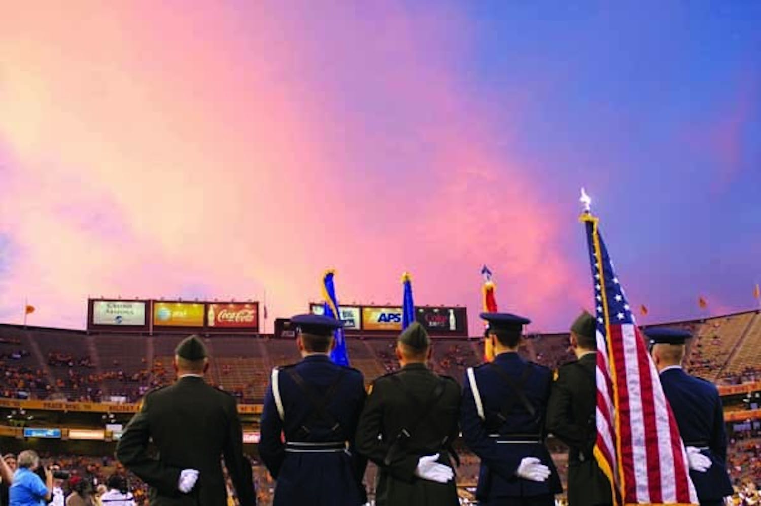 COLOR GUARD: Members of ASU's ROTC program present the flags at Saturday night's football game against NAU. (Photo by Scott Stuk)
