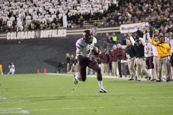 Junior running back Marion Grice carries the ball into the end zone for one of his three touchdown receptions in ASU’s 51-17 victory on Oct. 11 over Colorado. (Photo by Kyle Newman)
