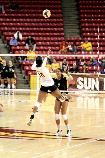 Senior middle blocker Erica Wilson rises to spike a ball during a match last season. The Sun Devils have won their last six games, their best start since 1997. (Photo by Sam Rosenbaum)
