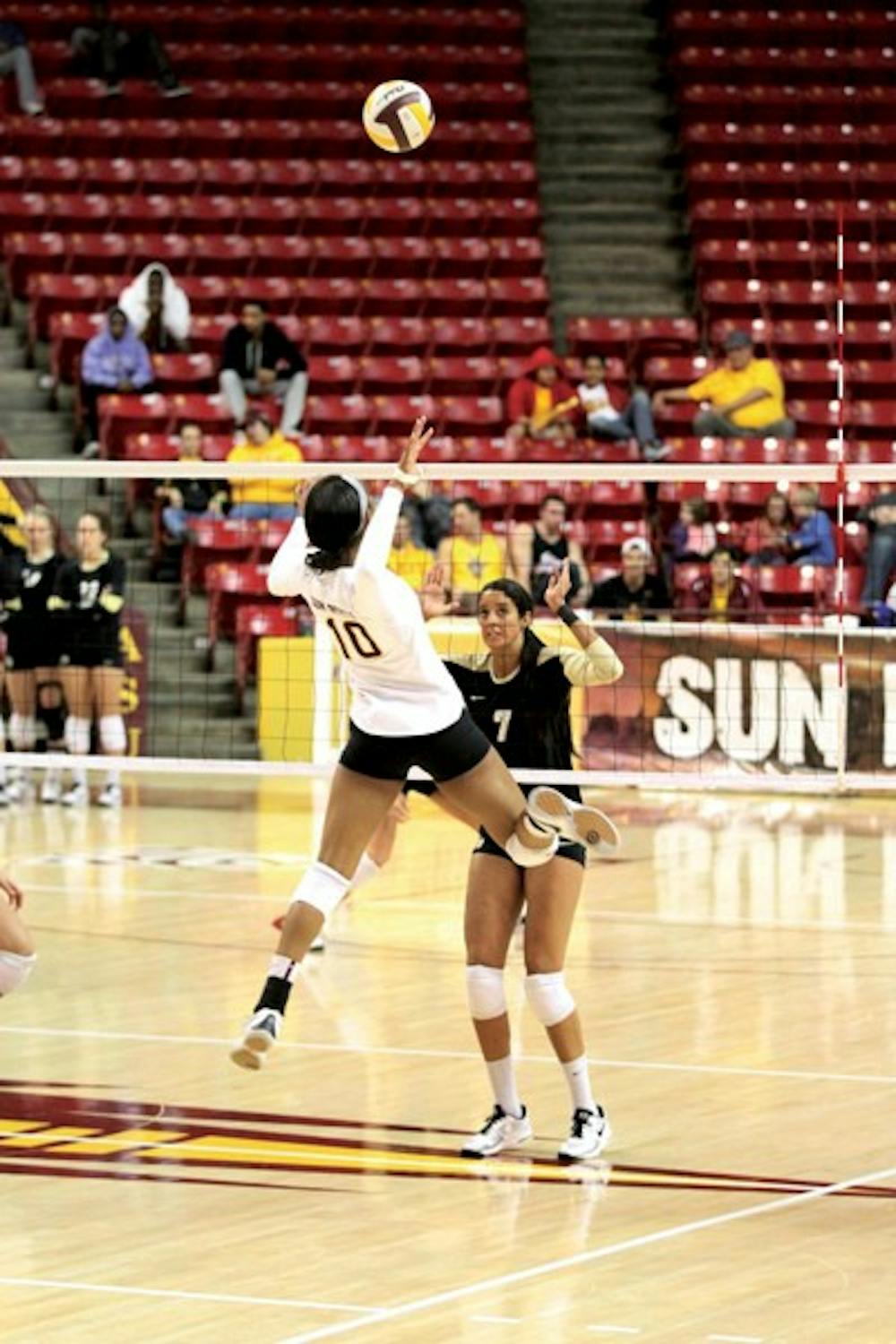 Senior middle blocker Erica Wilson rises to spike a ball during a match last season. The Sun Devils have won their last six games, their best start since 1997. (Photo by Sam Rosenbaum)