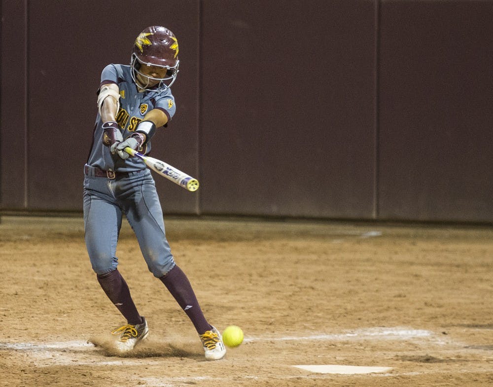 Freshman infielder Taylor Becerra makes contact with the ball during a game against San Diego at Alberta B. Farrington Softball Stadium in Tempe, Arizona, on Sunday, Feb. 14, 2016. The Sun Devils won the game, 9-1.