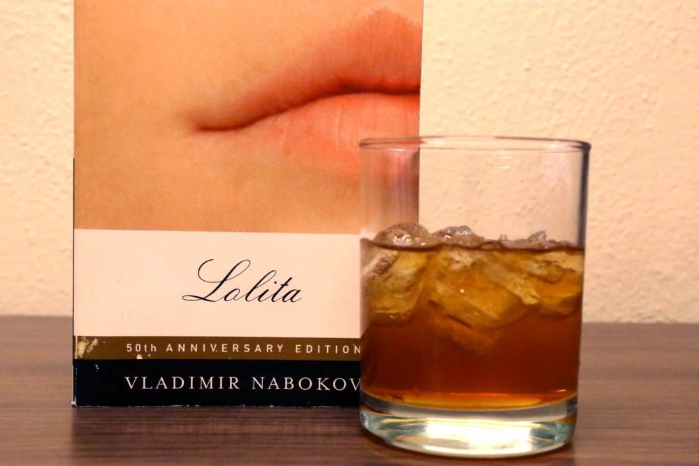 This week, columnist Carson Abernethy pairs 'Lolita' by Vladimir Nabokov with amaretto sour. Photo done on Tuesday, March 15, 2016.