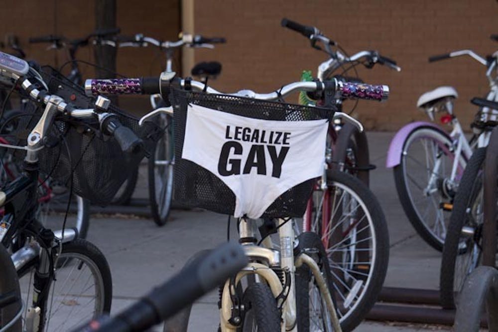 AT THE BIKE RACKS: An ASU student voices their position on gay marriage in an innovative way around campus. (Photo by Annie Wechter)