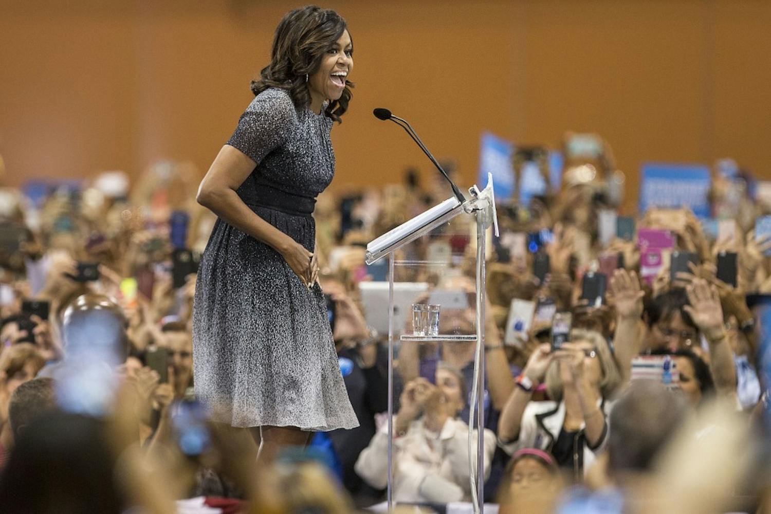 First lady Michelle Obama speaks to a crowd in the Phoenix Convention Center during a campaign stop for Democratic presidential nominee Hillary Clinton on Thursday, Oct. 20, 2016. 