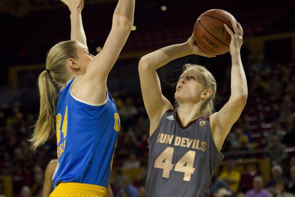 ASU senior center Sara Hattis (44) puts up a shot during a women's basketball game against the no. 15 ranked UCLA Bruins in Wells Fargo Arena in Tempe, Arizona on Sunday, Feb. 26, 2017. ASU lost 55-52.  (Josh Orcutt/State Press)