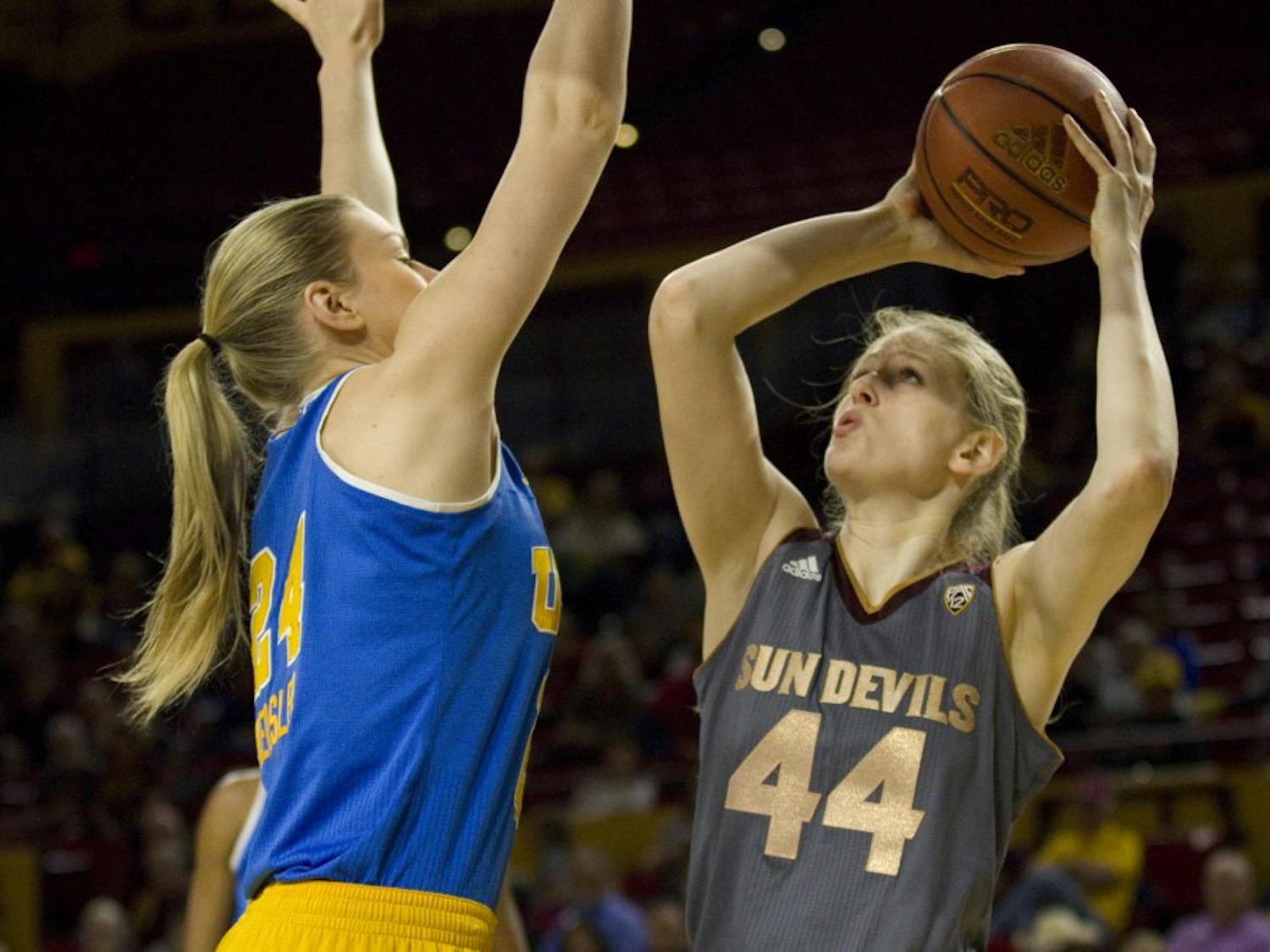 ASU senior center Sara Hattis (44) puts up a shot during a women's basketball game against the no. 15 ranked UCLA Bruins in Wells Fargo Arena in Tempe, Arizona on Sunday, Feb. 26, 2017. ASU lost 55-52.  (Josh Orcutt/State Press)