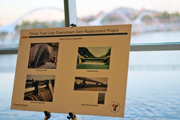 FUTURE PLANS: Easels are placed in the Tempe Center for the Arts Lakeside Room Monday night showcasing different dam structures that could be used to replace the current rubber dams on Tempe Town Lake.  The city council held a public presentation of the options and opened the floor for questions about the proposed dam to be completed by 2015. (Photo by Lisa Bartoli)
