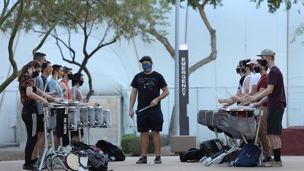 Arizona State University Sun Devil Percussion practices at Verde Dickey East Athletic Field on Friday, Oct. 9.