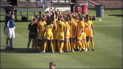 HIGH TECH: An ASU student enjoys the sun as he texts on his phone near the Barrett front lawn. ASU recently partnered with Japanese universities in the ongoing development of Consumer Electronic Devices, such as cell phones. (Photo by Michael Arellano)