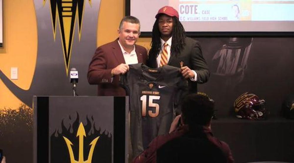 Davon Durant poses with coach Todd Graham on National Signing Day on Feb. 4, 2015. (Screengrab by Justin Janssen/The State Press) 