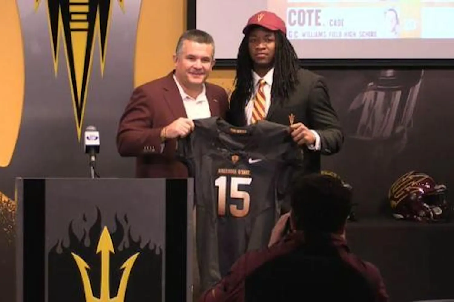Davon Durant poses with coach Todd Graham on National Signing Day on Feb. 4, 2015. (Screengrab by Justin Janssen/The State Press)