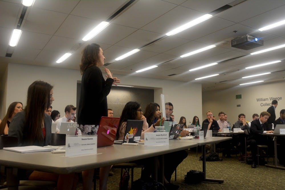 Melissa Woodward, Tempe USG senator, on Feb. 10, 2015 at the Memorial Union in Tempe. Melissa Woodward presented SB 64 Senate Replacement Provision, which caused heated a debate. (Krista Tillman/ The State Press)