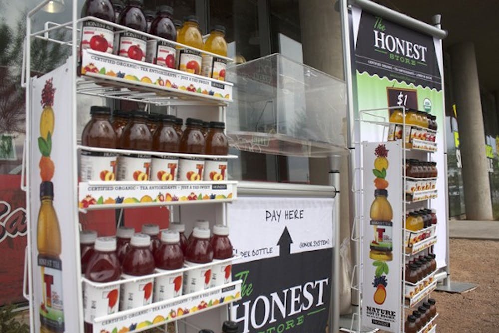 HONEST EXPERIMENT: The social experiment Honest City came to Tempe to see how the college town ranks in honesty around the nation.  Passersby could either leave a dollar for a tea refreshment or just take the drink without paying. (Photo by Shawn Raymundo)