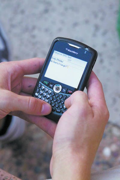 EMERGENCY: Police are considering using text messaging as a new way to alert authorities of a problem. (Photo by Annie Wechter)