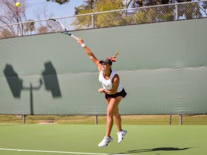 Kassidy Jump serves  the ball during a doubles match-up against the California Bears on  Friday, March 4, 2016, at the Whiteman Tennis Center in Tempe.