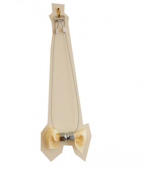 The bowtie necklace looks like it came straight off the runway. Photo courtesy of RunwayDIY.com.