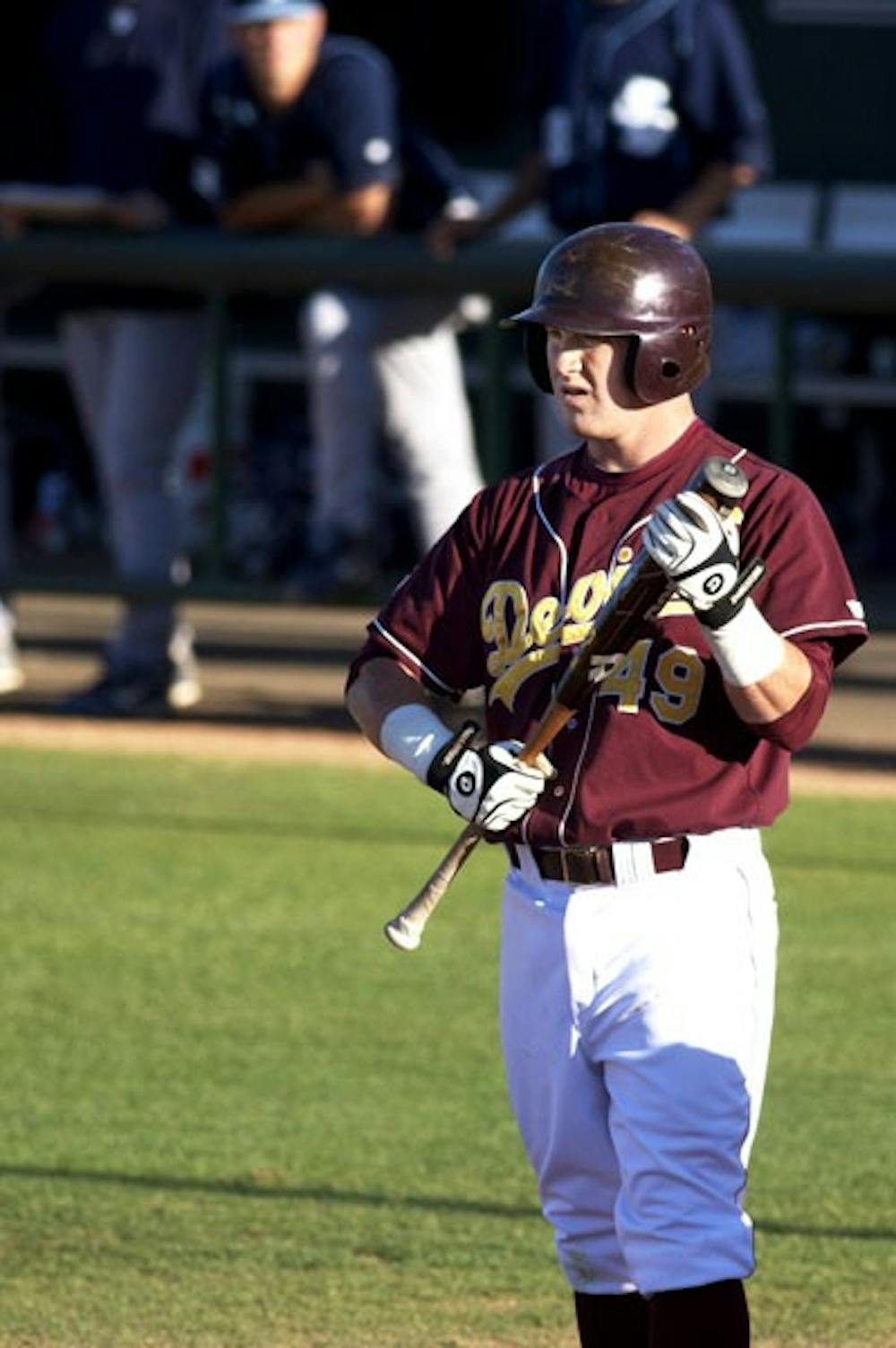 COMEBACK KINGS: Junior pitcher Jimmy Patterson delivers a pitch during the Sun Devils' 11-6 win over USD on Tuesday at Packard Stadium. Patterson was roughed up on the mound, but hit a home run to help ASU overcome a five-run deficit. (Photo by Scott Stuk)