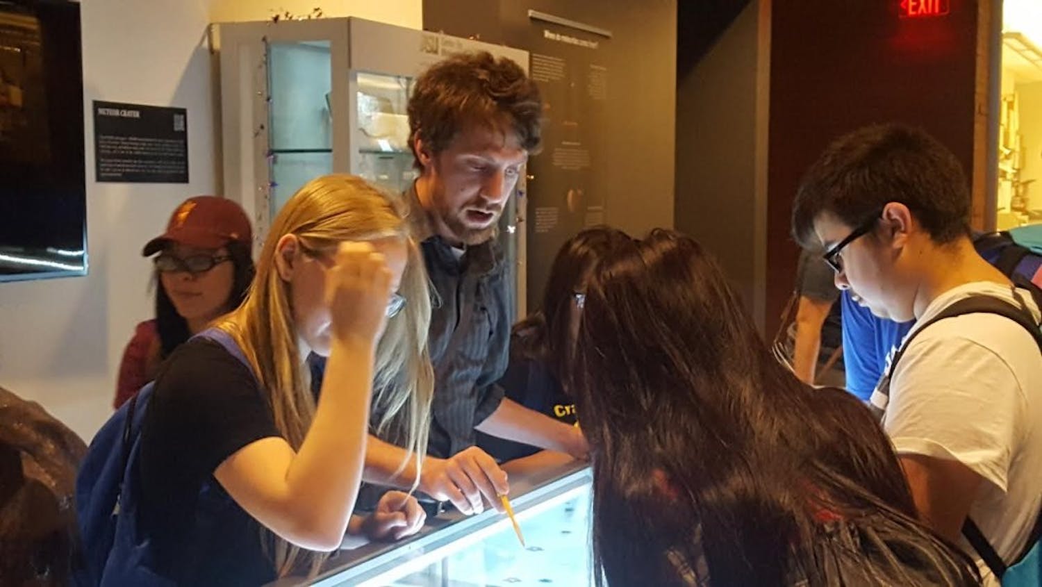 Maryvale High School&nbsp;teacher&nbsp;Huntington Keith leads students through the Gallery of Scientific Exploration on Oct.&nbsp;8, 2016.