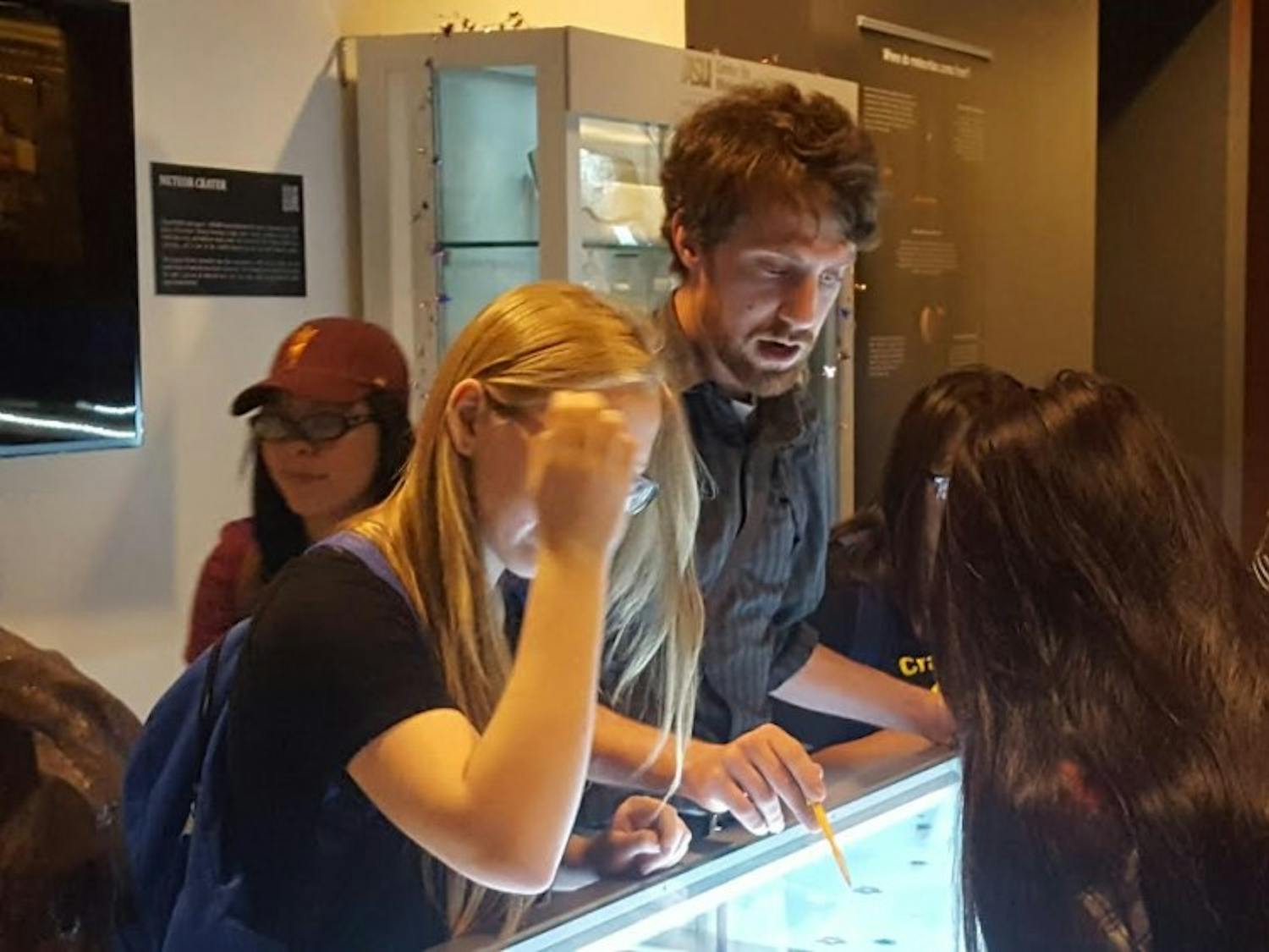 Maryvale High School&nbsp;teacher&nbsp;Huntington Keith leads students through the Gallery of Scientific Exploration on Oct.&nbsp;8, 2016.