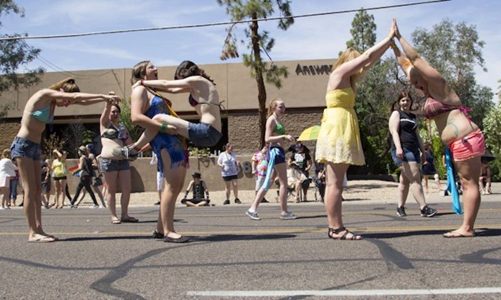 During the parade the sorority would occasionally stop to pose in Greek letters. (Photo by Ana Ramirez) 