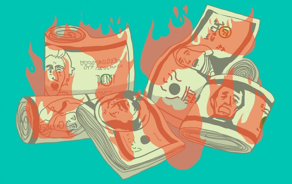 Wads of Cash on Fire